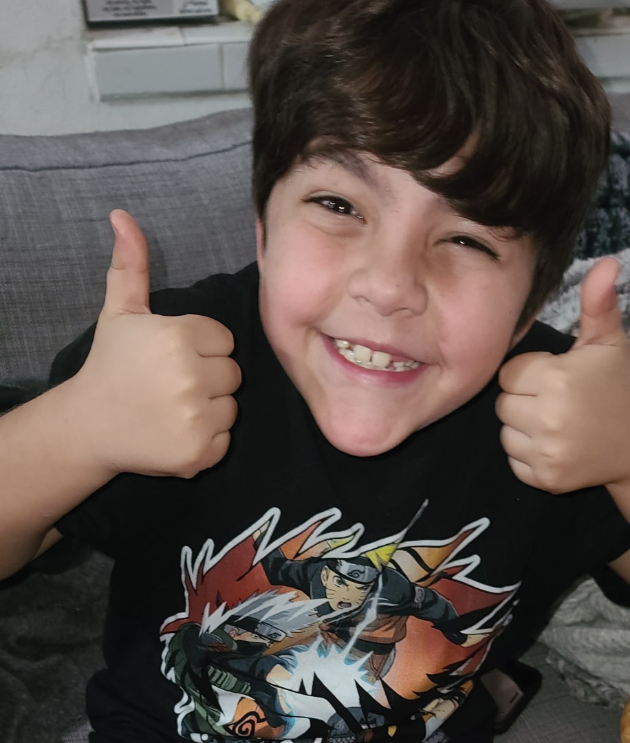 Tutoring student giving thumbs up